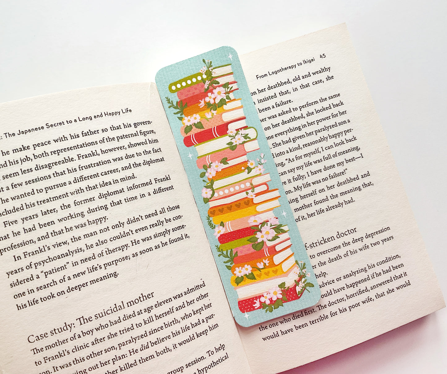 Bookstack with Florals Bookmark – Elegant Literary Design